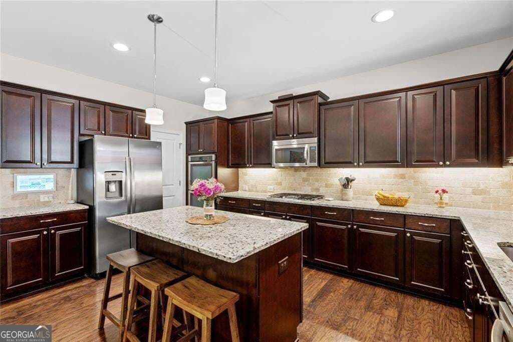5 bedroom, 3 bathroom, 3,436 sq ft single family residence for sale at 2335 Copper Mill Trail, Cumming, GA 30041 — photo 10
