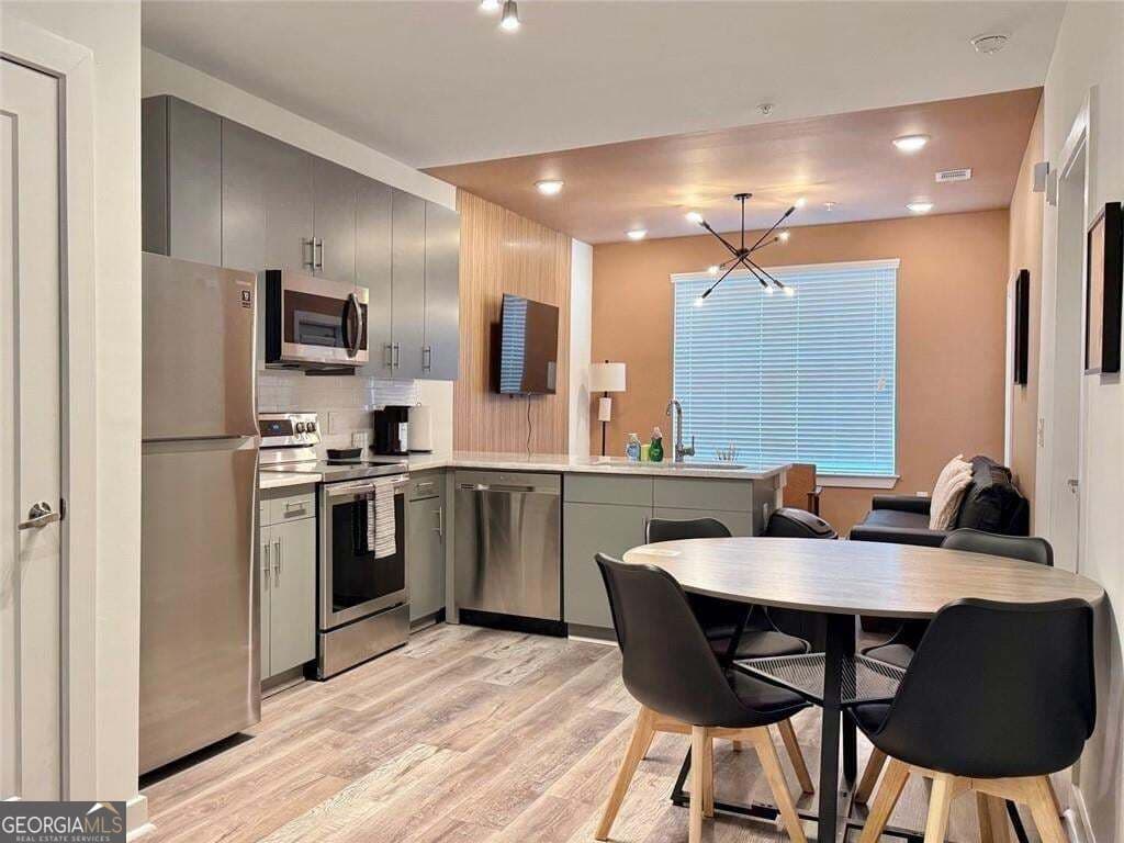 1 bedroom, 1 bathroom, 657 sq ft condominium for sale at 525 Parkway Drive 108, Atlanta, GA 30308 — photo 1 of 15