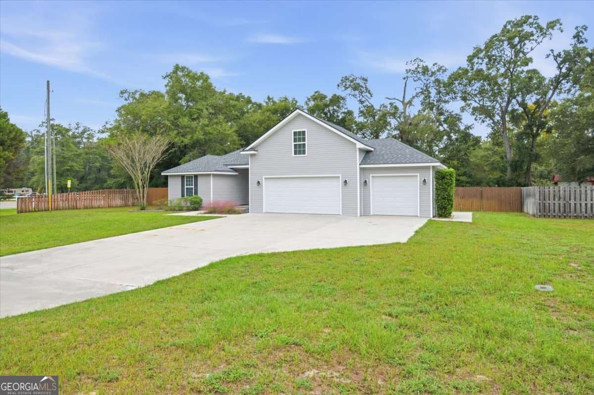 4 bedroom, 2 bathroom single family residence for sale at 101 Fairhaven Court, Guyton, GA 31312 — photo 2