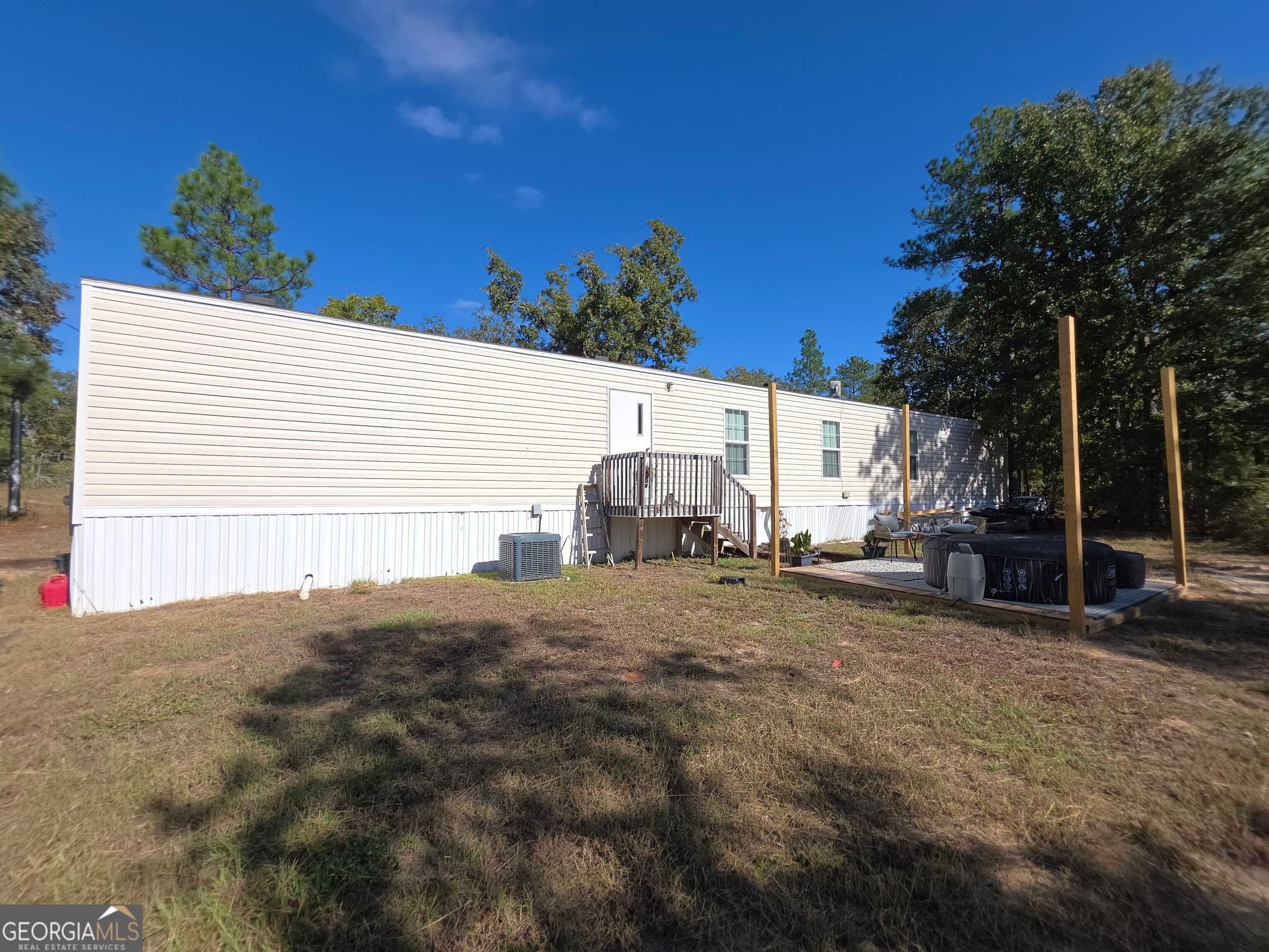 3 bedroom, 2 bathroom, 1,216 sq ft manufactured home,single family residence for sale at 6362 N Highway 221, Matthews, GA 30818 — photo 2