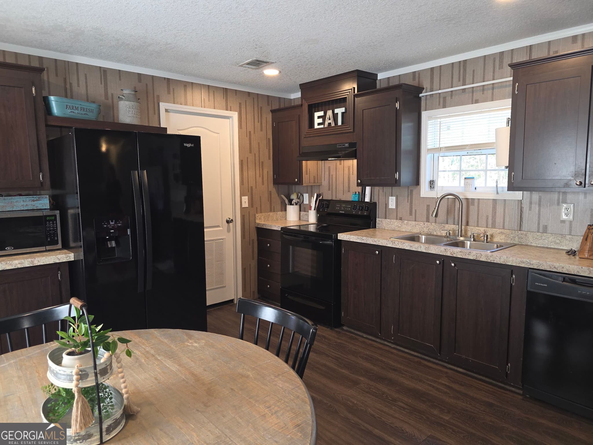3 bedroom, 2 bathroom, 1,216 sq ft manufactured home,single family residence for sale at 6362 N Highway 221, Matthews, GA 30818 — photo 6