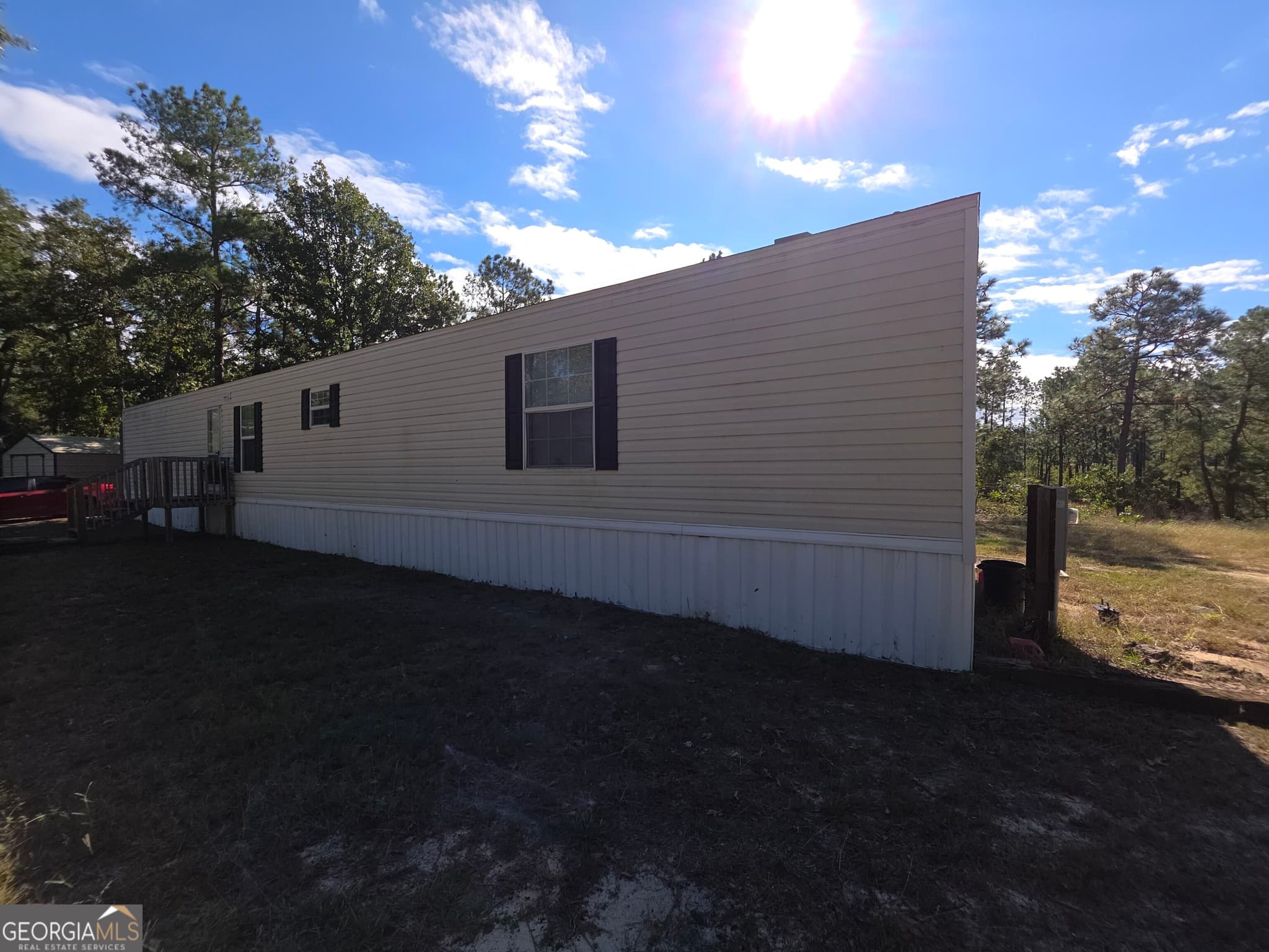 3 bedroom, 2 bathroom, 1,216 sq ft manufactured home,single family residence for sale at 6362 N Highway 221, Matthews, GA 30818 — photo 3