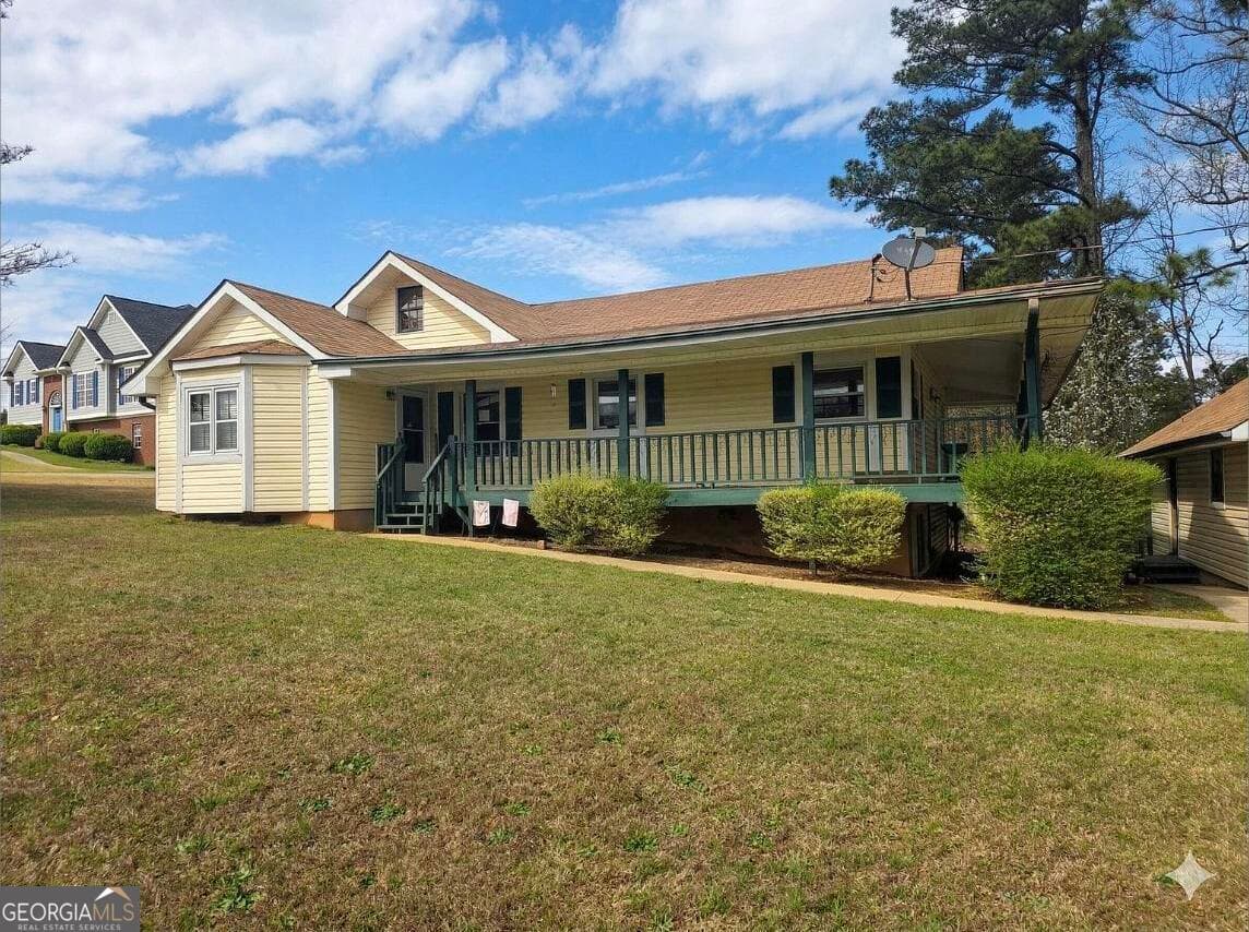 4 bedroom, 2 bathroom, 1,807 sq ft single family residence for sale at 9000 Edinburg Drive, Winston, GA 30187 — photo 3
