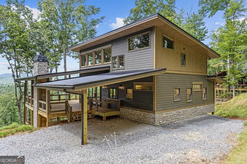4 bedroom, 3.5 bathroom, 3,000 sq ft cabin,single family residence sold at 394 Mountain Trace, Cherry Log, GA 30522