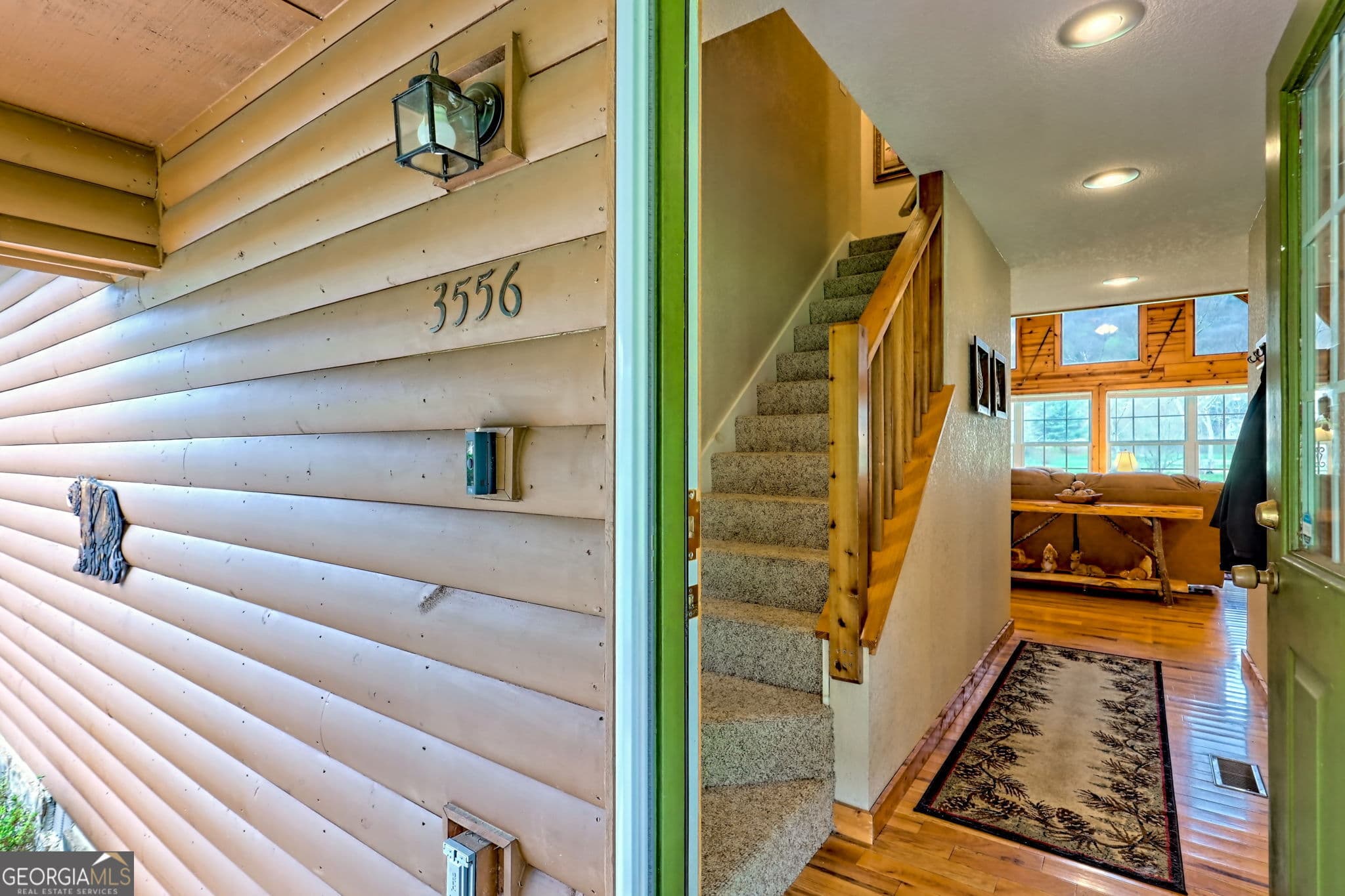 3 bedroom, 2.5 bathroom, 1,920 sq ft cabin,single family residence under contract at 3556 Riverfront Lane, Hiawassee, GA 30546 — photo 2