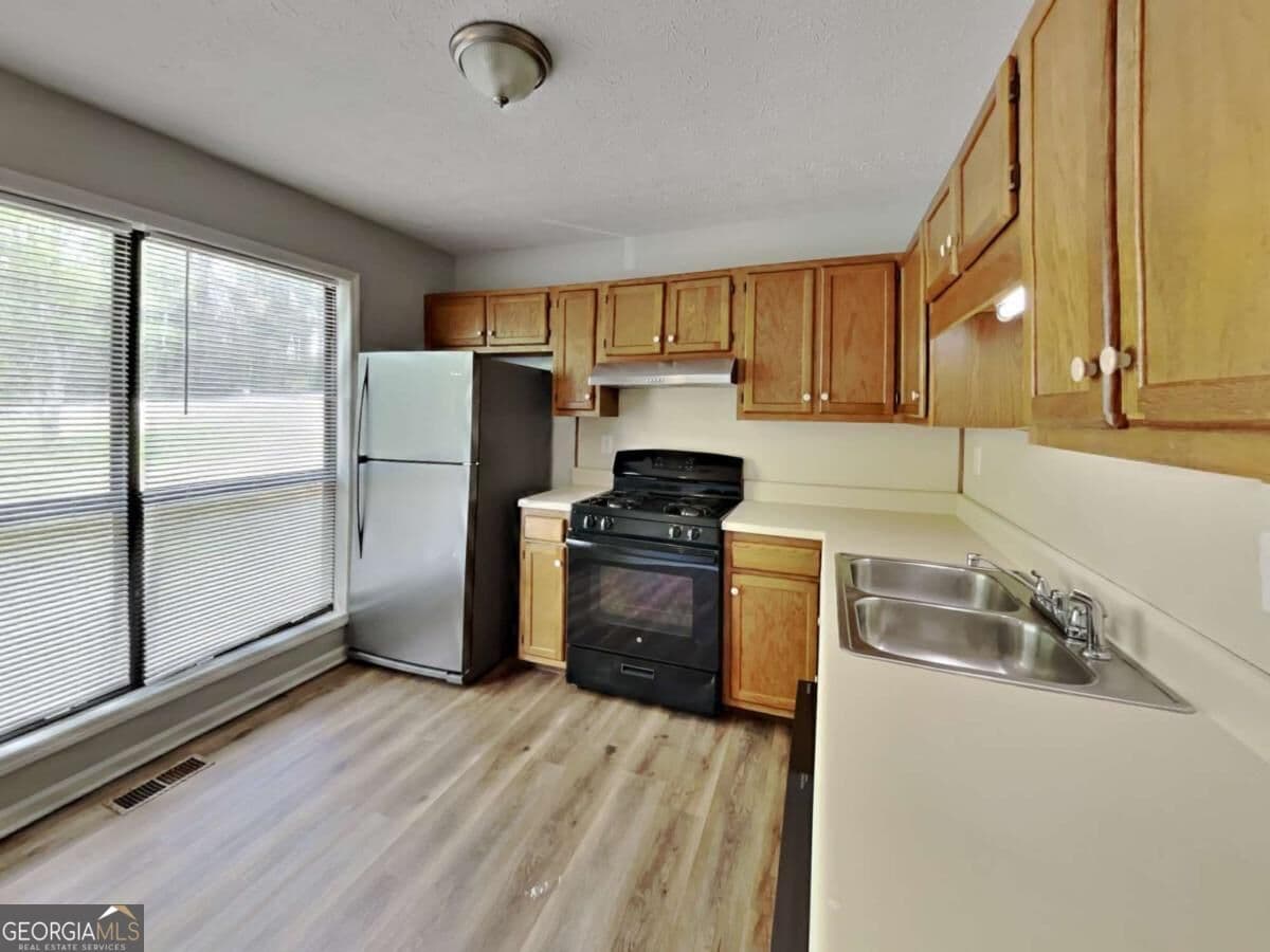 3 bedroom, 2 bathroom single family residence for rent at 2664 Bomar Road, Douglasville, GA 30135 for $1,680 a month — photo 2