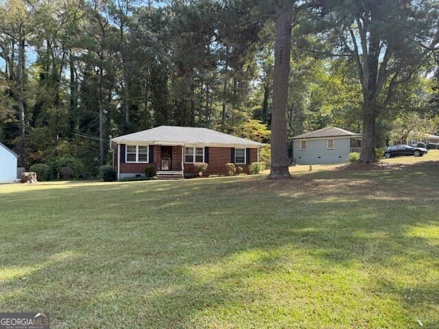 3 bedroom, 1 bathroom, 1,107 sq ft single family residence for sale at 1529 N Columbia Place, Decatur, GA 30032 — photo 2