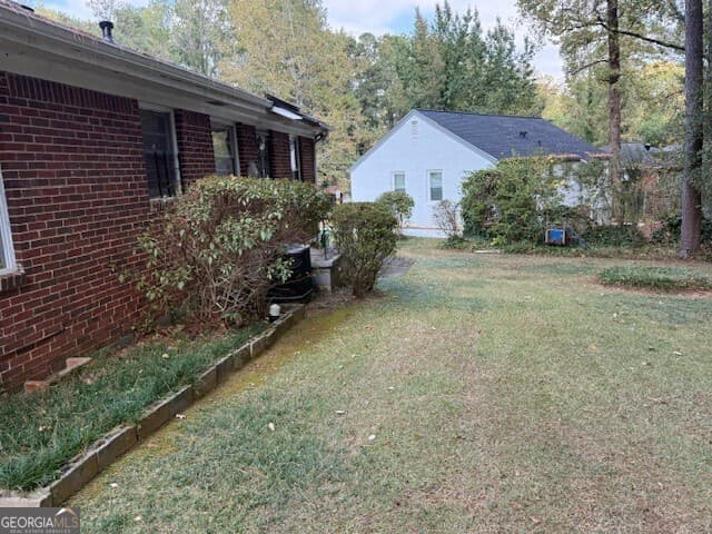 3 bedroom, 1 bathroom, 1,107 sq ft single family residence for sale at 1529 N Columbia Place, Decatur, GA 30032 — photo 7