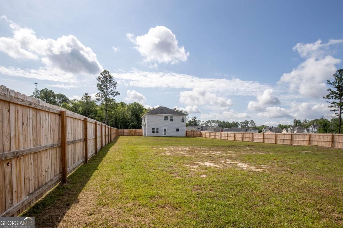 4 bedroom, 2.5 bathroom, 1,852 sq ft single family residence for sale at 247 Morgan Field Boulevard, Ludowici, GA 31316 — photo 7