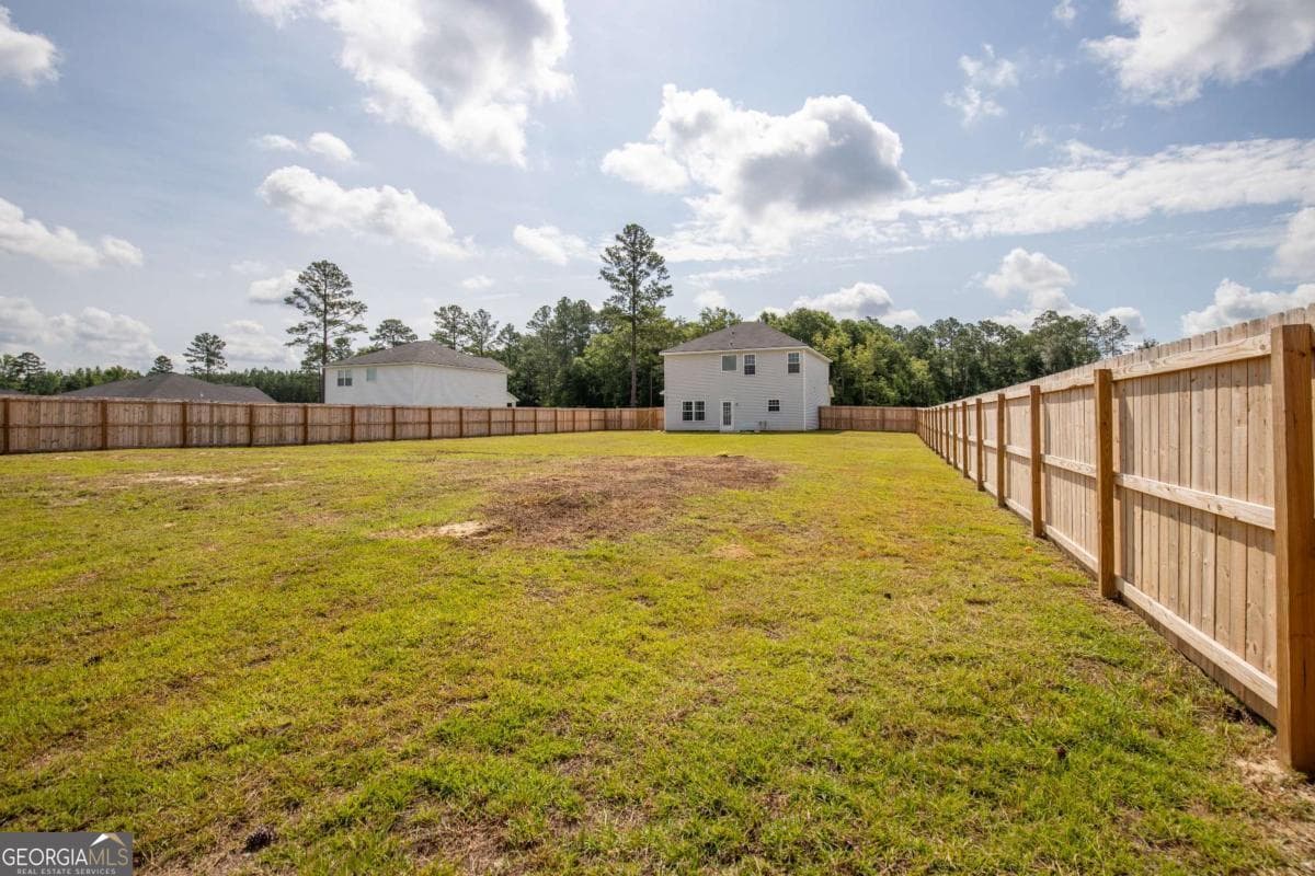 4 bedroom, 2.5 bathroom, 1,852 sq ft single family residence for sale at 247 Morgan Field Boulevard, Ludowici, GA 31316 — photo 8