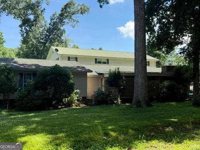7 bedroom, 4.5 bathroom, 6,018 sq ft single family residence for sale at 180 Dixon Road, Demorest, GA 30535 — photo 3