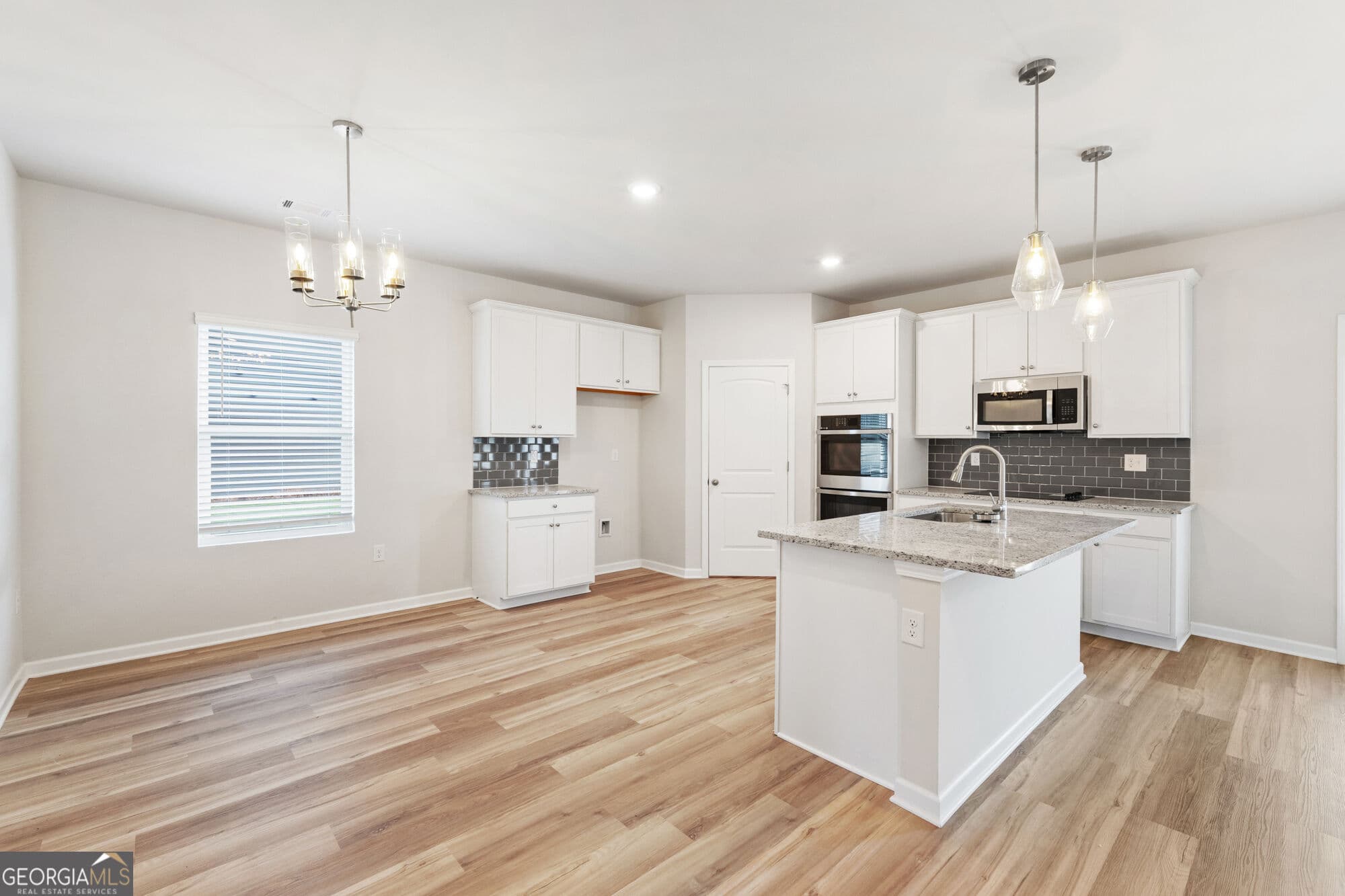 4 bedroom, 3 bathroom, 2,500 sq ft single family residence for sale at 1021 WHITMAN Way, Greensboro, GA 30642 — photo 3