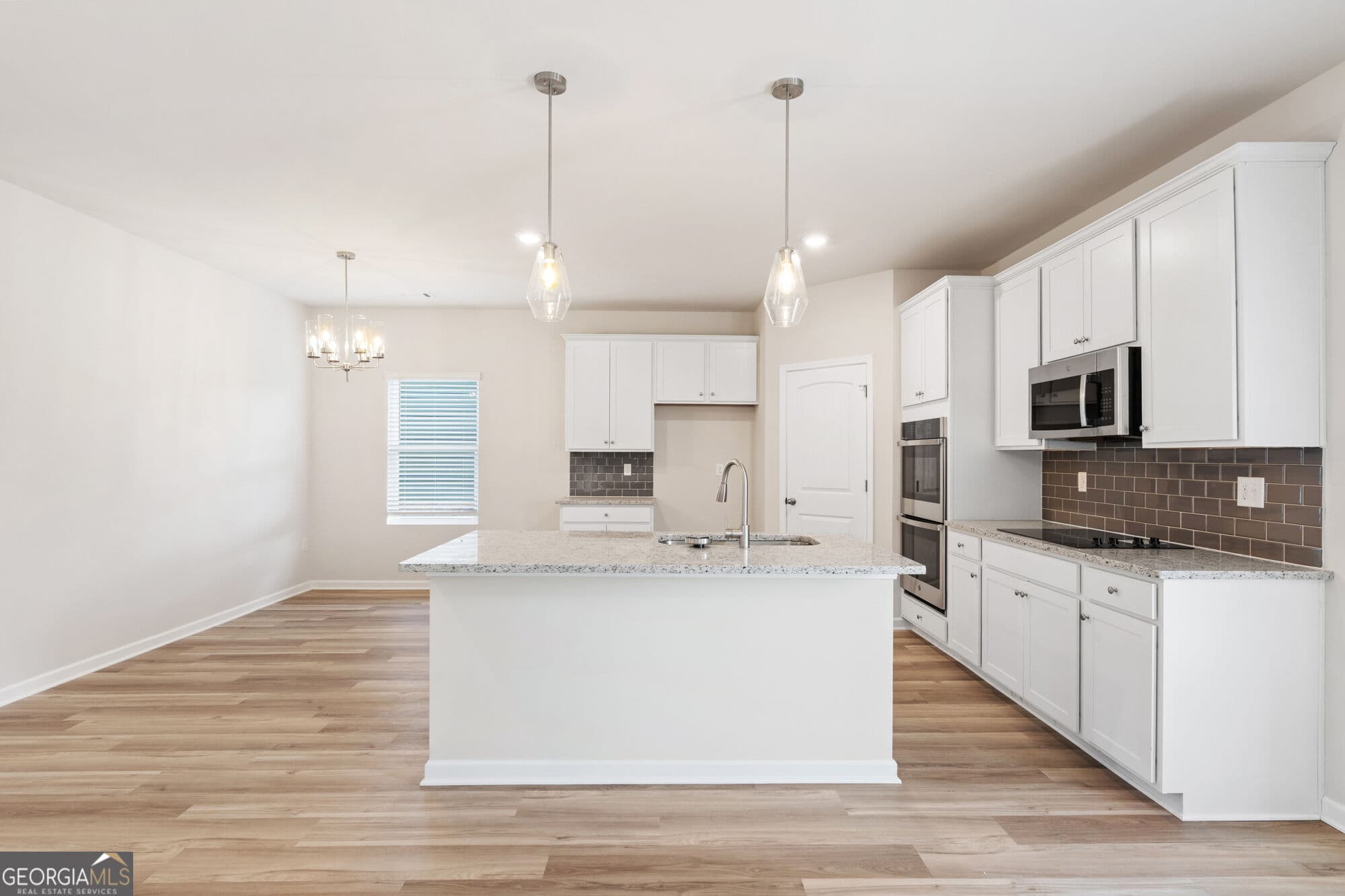 4 bedroom, 3 bathroom, 2,500 sq ft single family residence for sale at 1021 WHITMAN Way, Greensboro, GA 30642 — photo 5