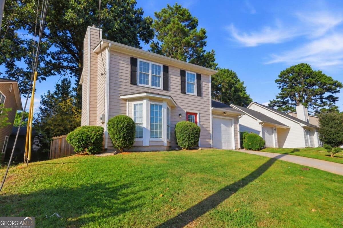 3 bedroom, 2.5 bathroom, 1,402 sq ft single family residence for sale at 5038 Donnell Way, Decatur, GA 30035 — photo 2
