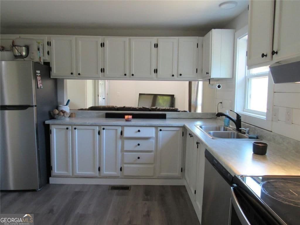 3 bedroom, 2 bathroom, 1,152 sq ft manufactured home,single family residence under contract at 1460 Hwy 100, Bowdon, GA 30108 — photo 5