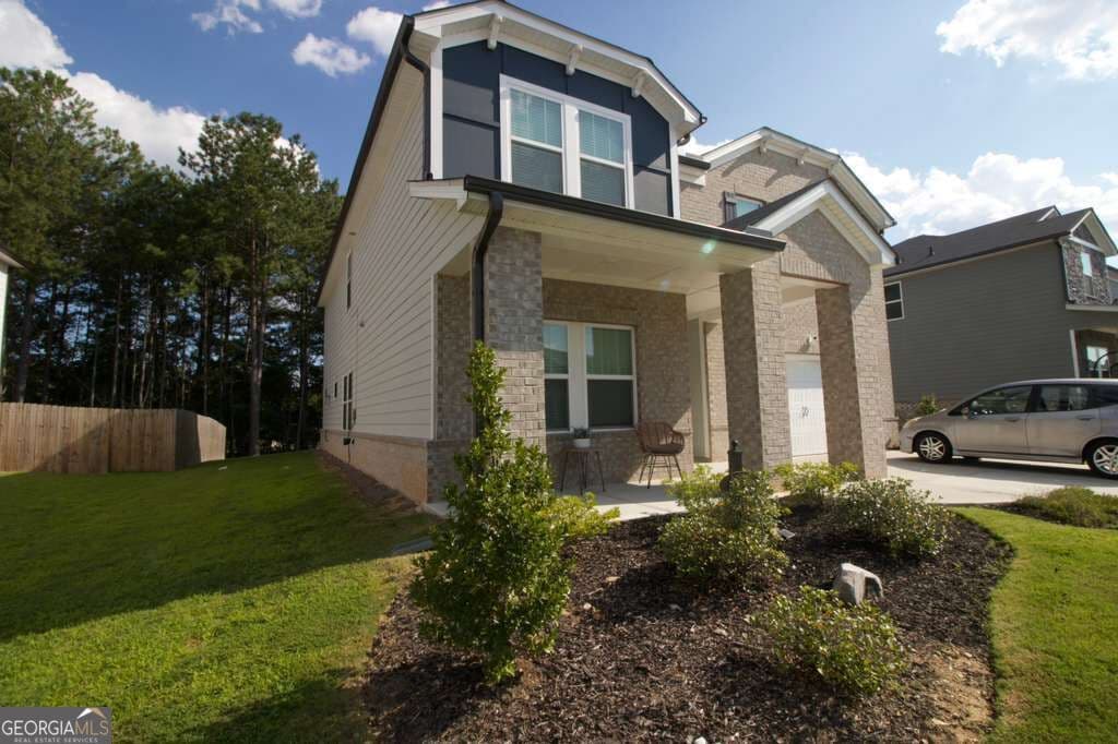 5 bedroom, 4.5 bathroom, 3,252 sq ft single family residence for sale at 4211 Dean Grove Way, Loganville, GA 30052 — photo 2
