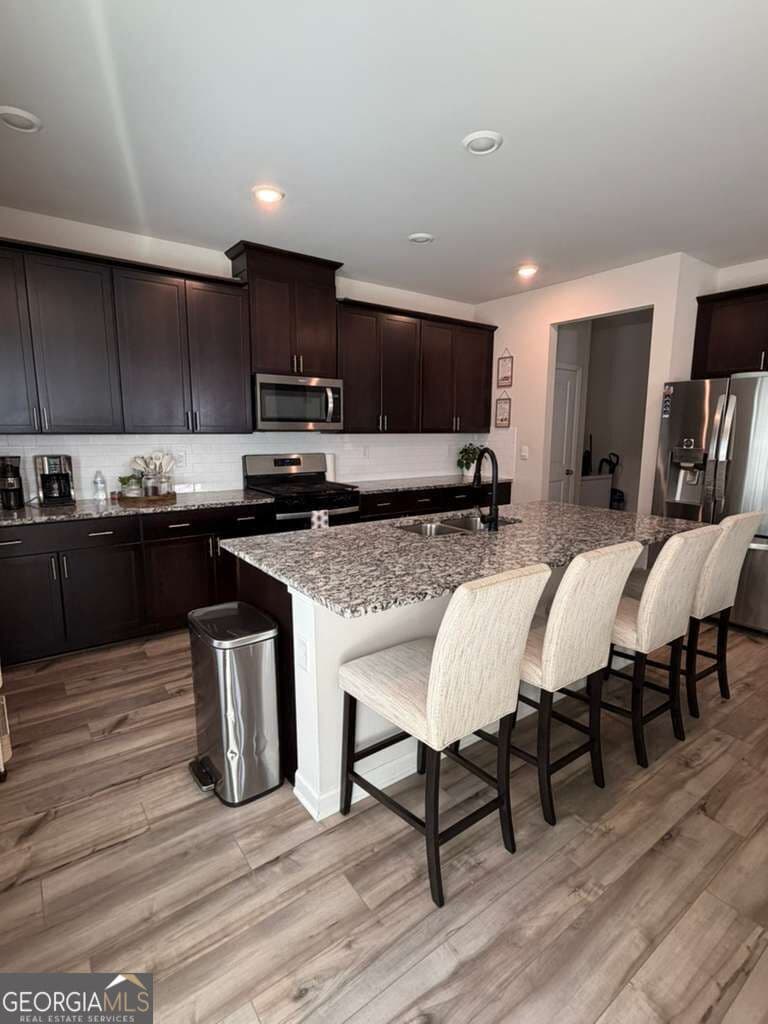 5 bedroom, 4.5 bathroom, 3,252 sq ft single family residence for sale at 4211 Dean Grove Way, Loganville, GA 30052 — photo 6