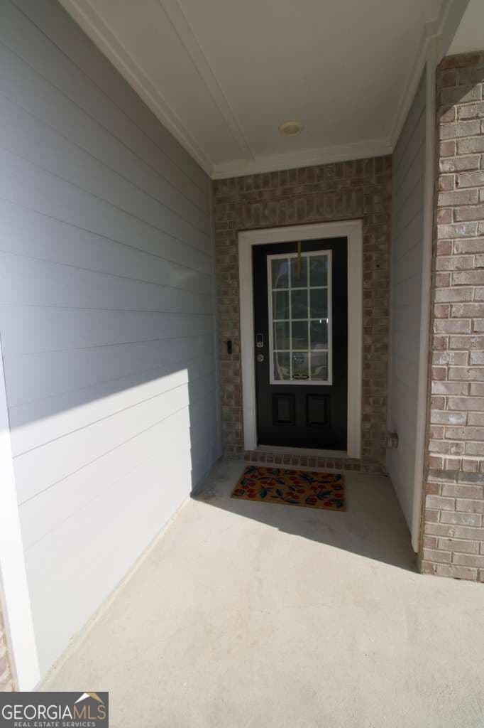 5 bedroom, 4.5 bathroom, 3,252 sq ft single family residence for sale at 4211 Dean Grove Way, Loganville, GA 30052 — photo 4
