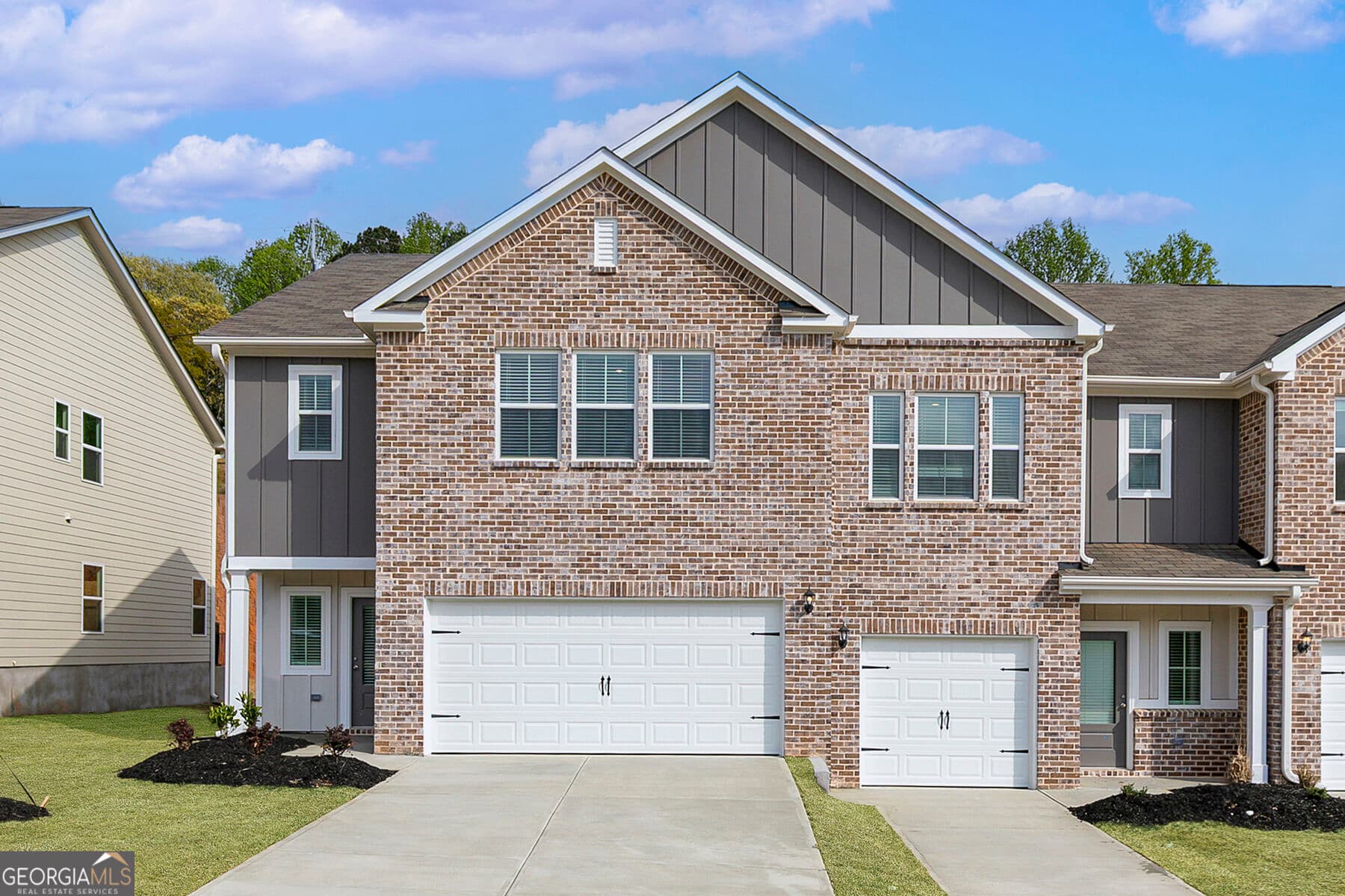 4 bedroom, 2.5 bathroom, 2,252 sq ft townhouse for sale at 4130 Oakwood Terrace Court, Oakwood, GA 30566 — photo 1 of 34