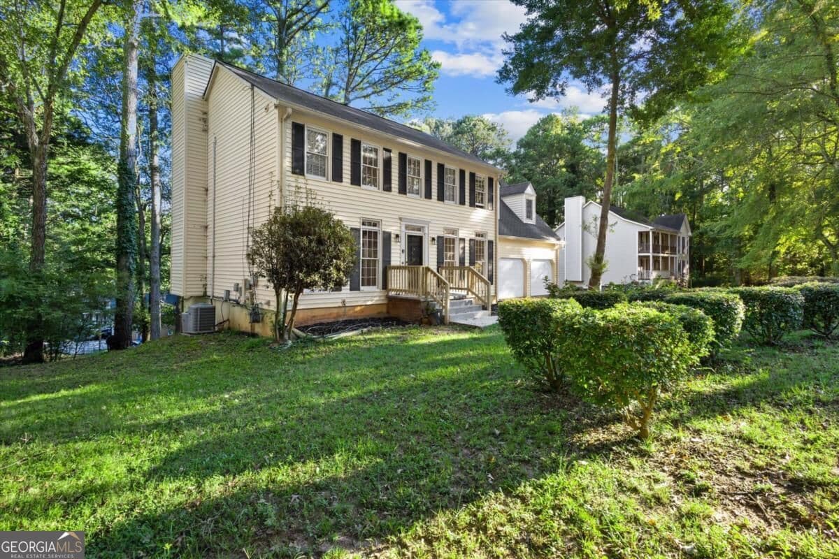 5 bedroom, 3.5 bathroom, 4,852 sq ft single family residence for sale at 2092 Plantation Road, Lawrenceville, GA 30044 — photo 2