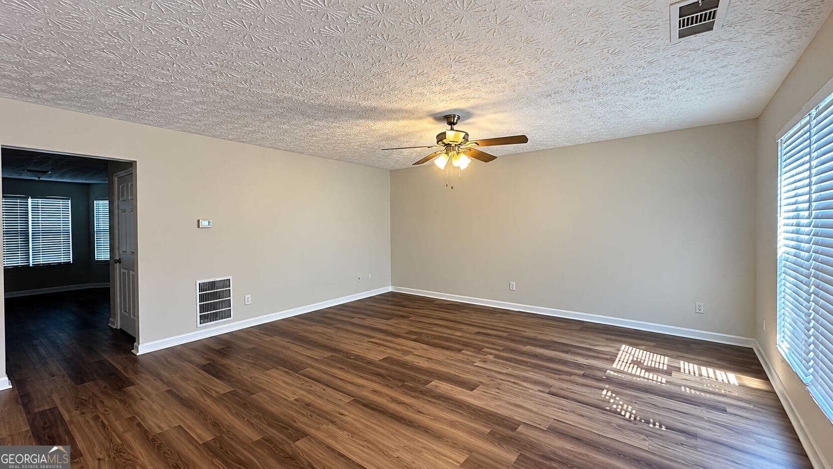 3 bedroom, 2.5 bathroom, 1,416 sq ft townhouse for sale at 2055 Grove Way, Hampton, GA 30228 — photo 3