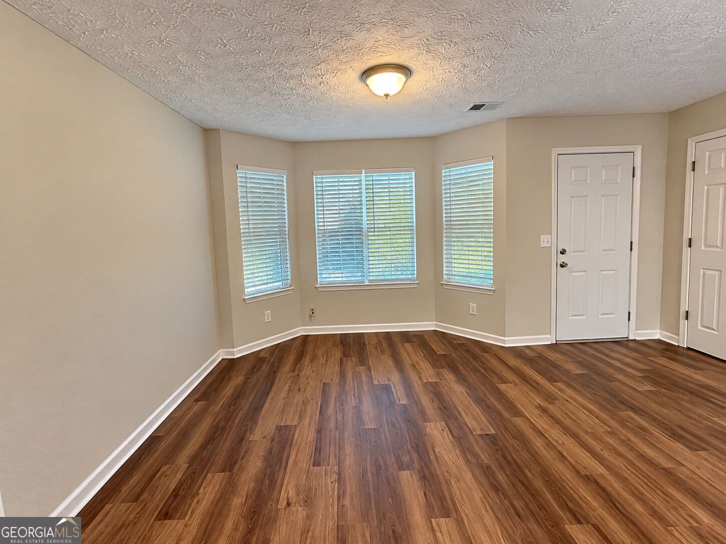 3 bedroom, 2.5 bathroom, 1,416 sq ft townhouse for sale at 2055 Grove Way, Hampton, GA 30228 — photo 9