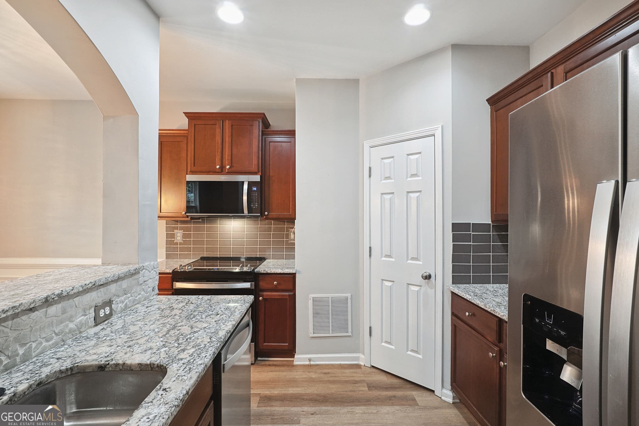 3 bedroom, 2.5 bathroom, 1,764 sq ft single family residence for sale at 5659 Chatham Circle, Norcross, GA 30071 — photo 2