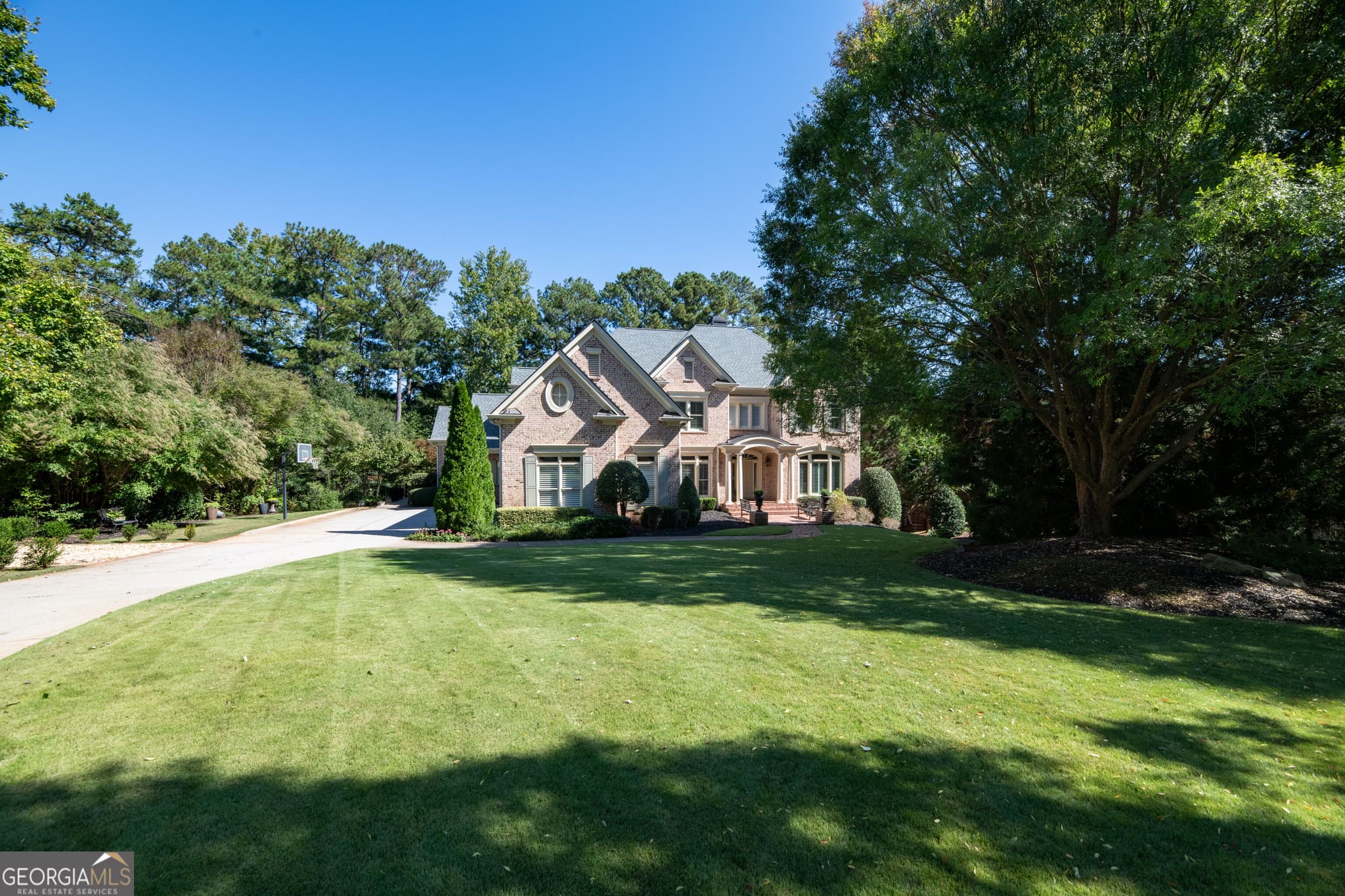 5 bedroom, 5.5 bathroom, 4,419 sq ft single family residence for sale at 2155 Wood Falls Drive, Cumming, GA 30041 — photo 8