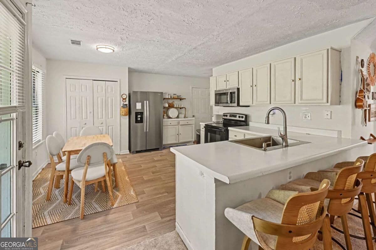 4 bedroom, 2.5 bathroom, 2,188 sq ft single family residence for sale at 2795 Da Vinci Boulevard, Decatur, GA 30034 — photo 8