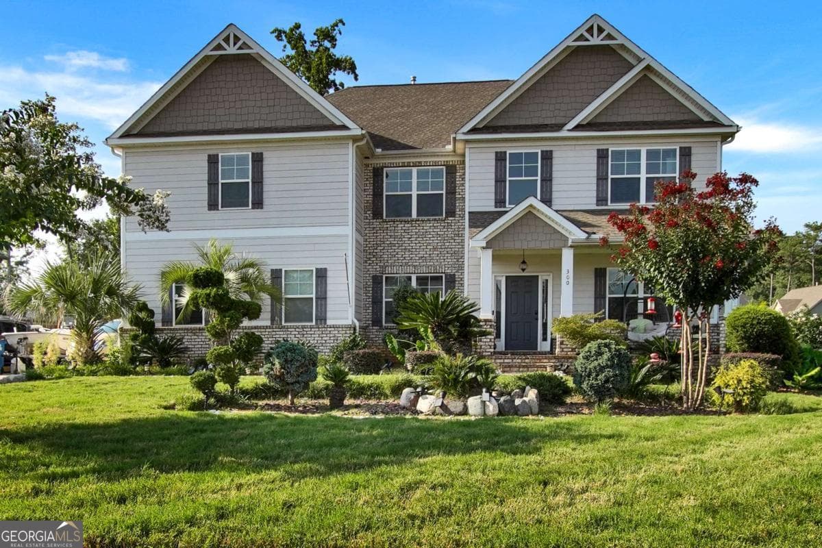 5 bedroom, 4 bathroom, 5,306 sq ft single family residence for sale at 300 Onyx Drive, Mcdonough, GA 30252 — photo 1 of 54