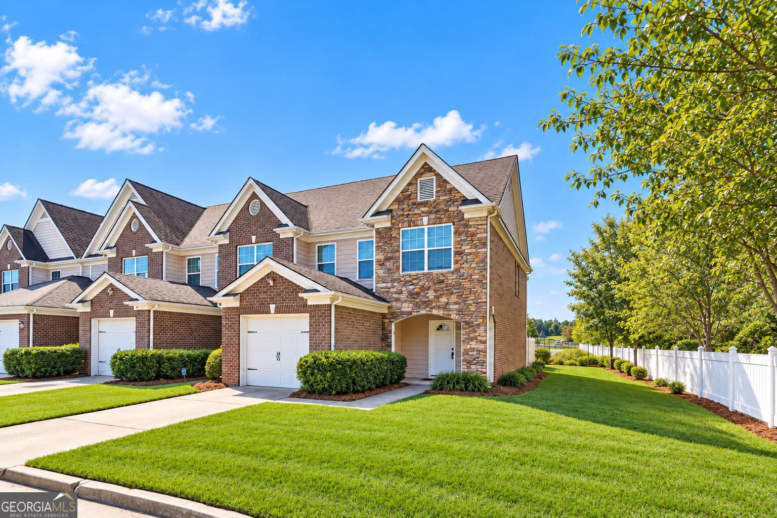 3 bedroom, 2.5 bathroom, 1,836 sq ft townhouse for sale at 322 Village Drive, Loganville, GA 30052 — photo 1 of 23
