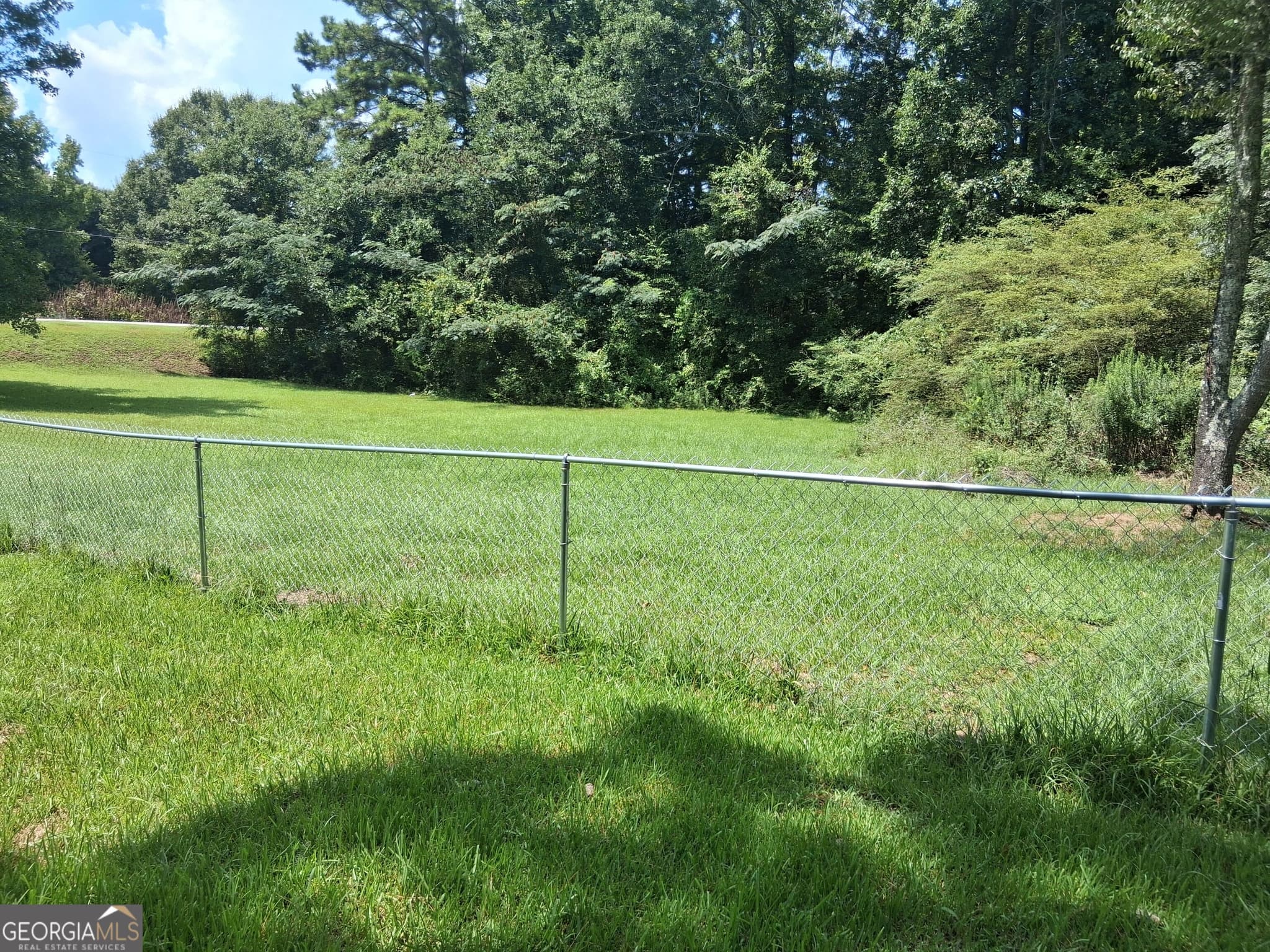 2 bedroom, 2 bathroom, 1,402 sq ft single family residence for sale at 265 Hickman Road, Forsyth, GA 31029 — photo 2