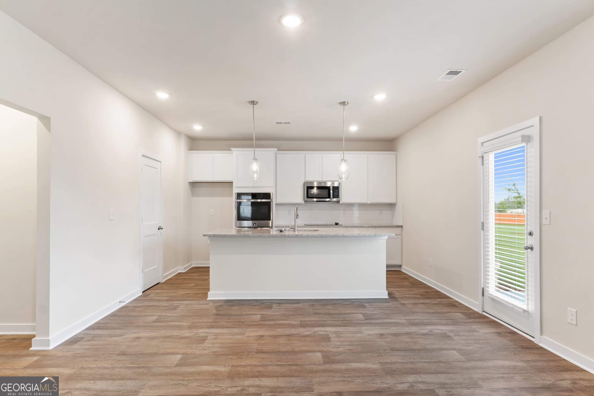 4 bedroom, 3 bathroom, 2,700 sq ft single family residence for sale at 719 Coneflower Way, Mcdonough, GA 30253 — photo 6