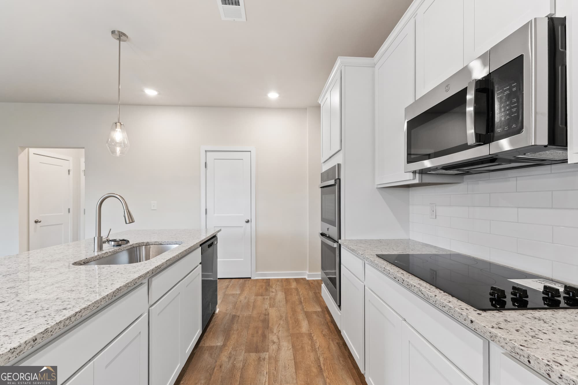 4 bedroom, 3 bathroom, 2,700 sq ft single family residence for sale at 719 Coneflower Way, Mcdonough, GA 30253 — photo 3