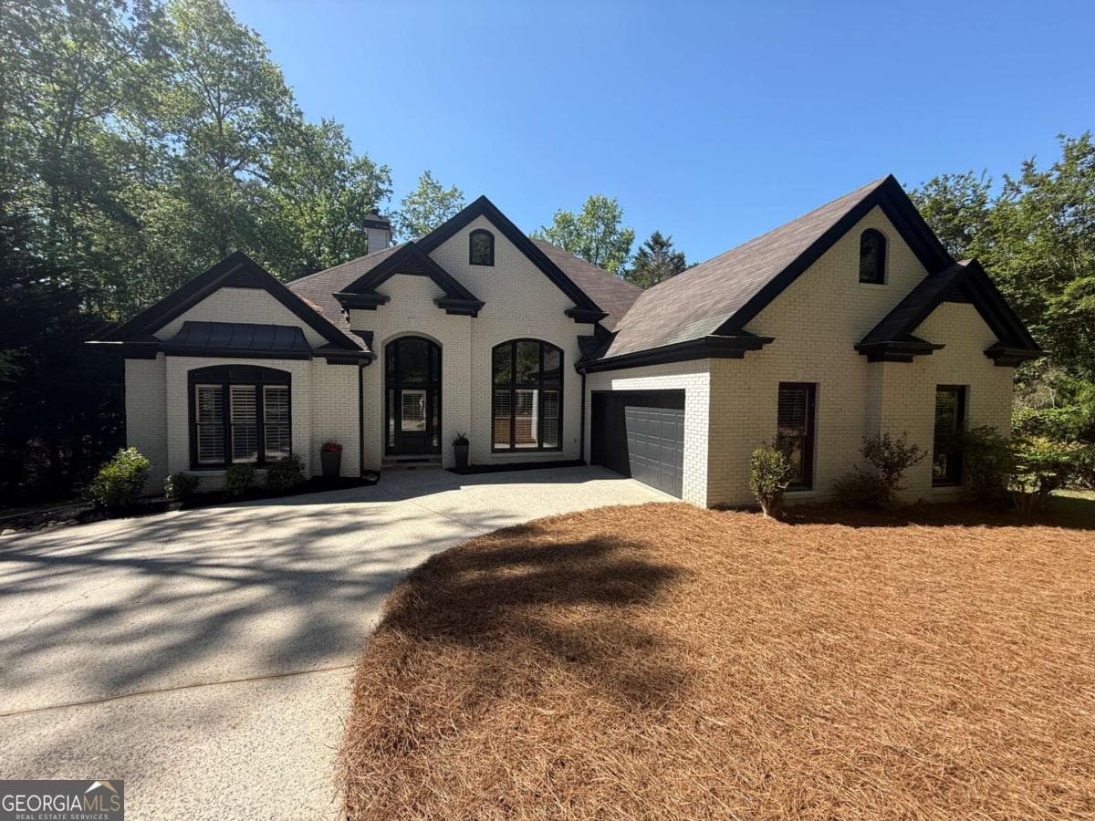 4 bedroom, 4.5 bathroom, 5,142 sq ft single family residence sold at 7725 Harbour Walk, Cumming, GA 30041