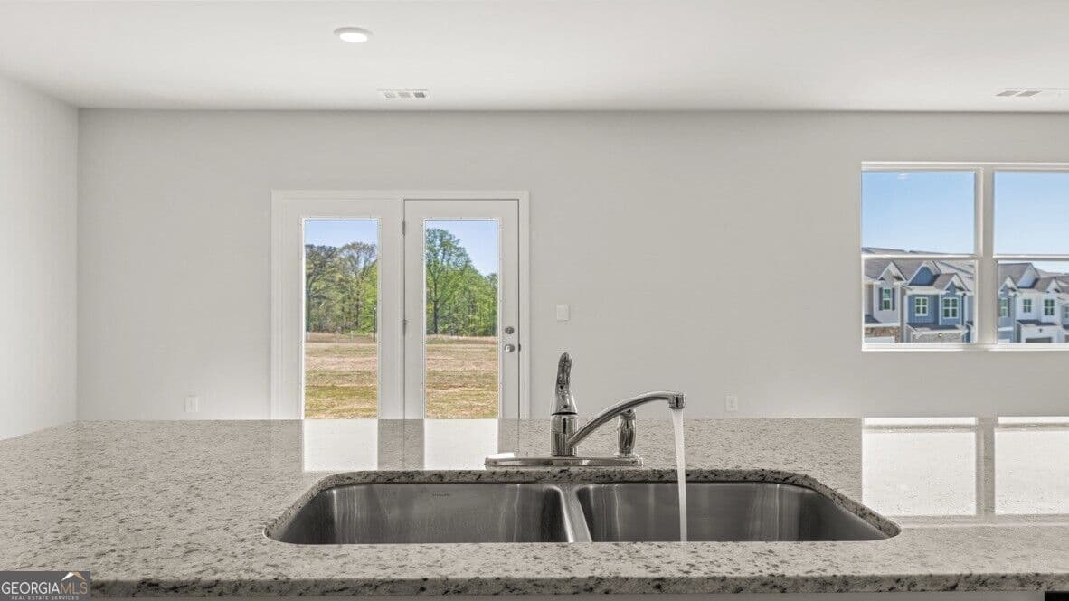 4 bedroom, 2.5 bathroom, 1,927 sq ft single family residence for sale at 409 Creekview Way, Dallas, GA 30132 — photo 8