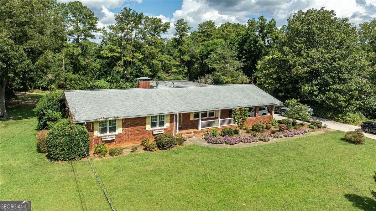 4 bedroom, 3 bathroom, 3,820 sq ft single family residence for sale at 580 Hurt Road, Smyrna, GA 30082 — photo 2