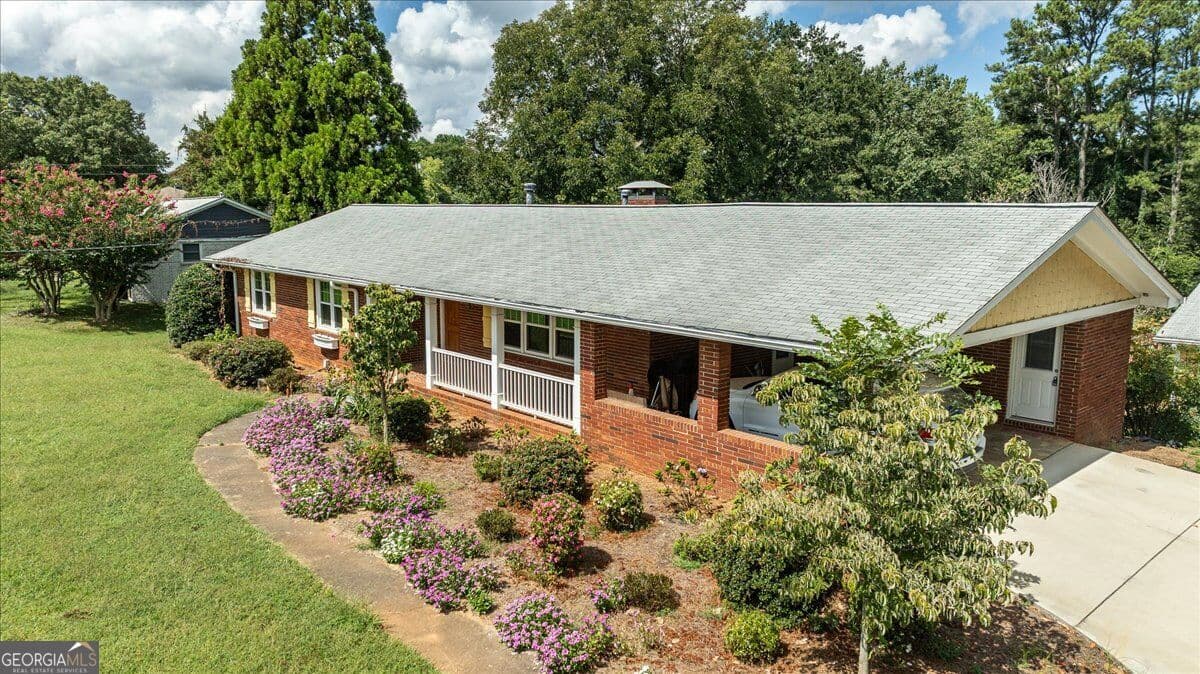 4 bedroom, 3 bathroom, 3,820 sq ft single family residence for sale at 580 Hurt Road, Smyrna, GA 30082 — photo 6