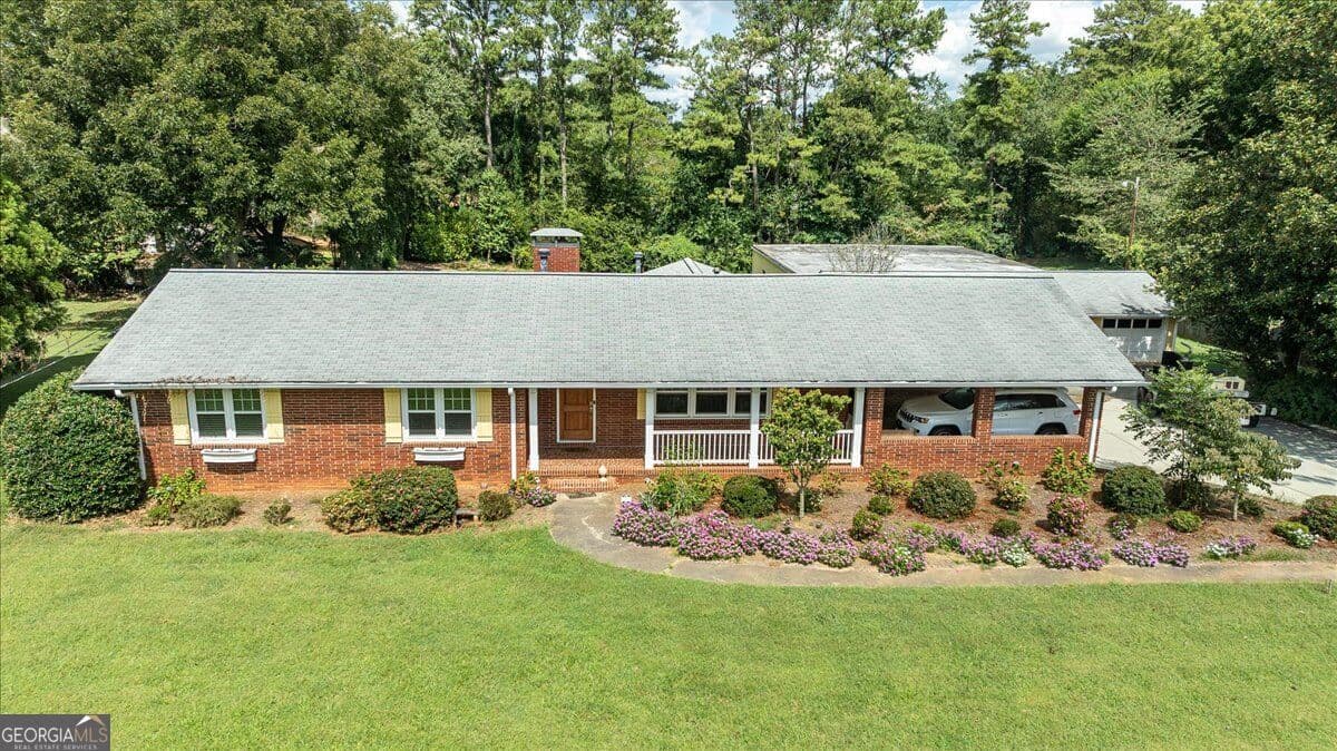 4 bedroom, 3 bathroom, 3,820 sq ft single family residence for sale at 580 Hurt Road, Smyrna, GA 30082 — photo 3
