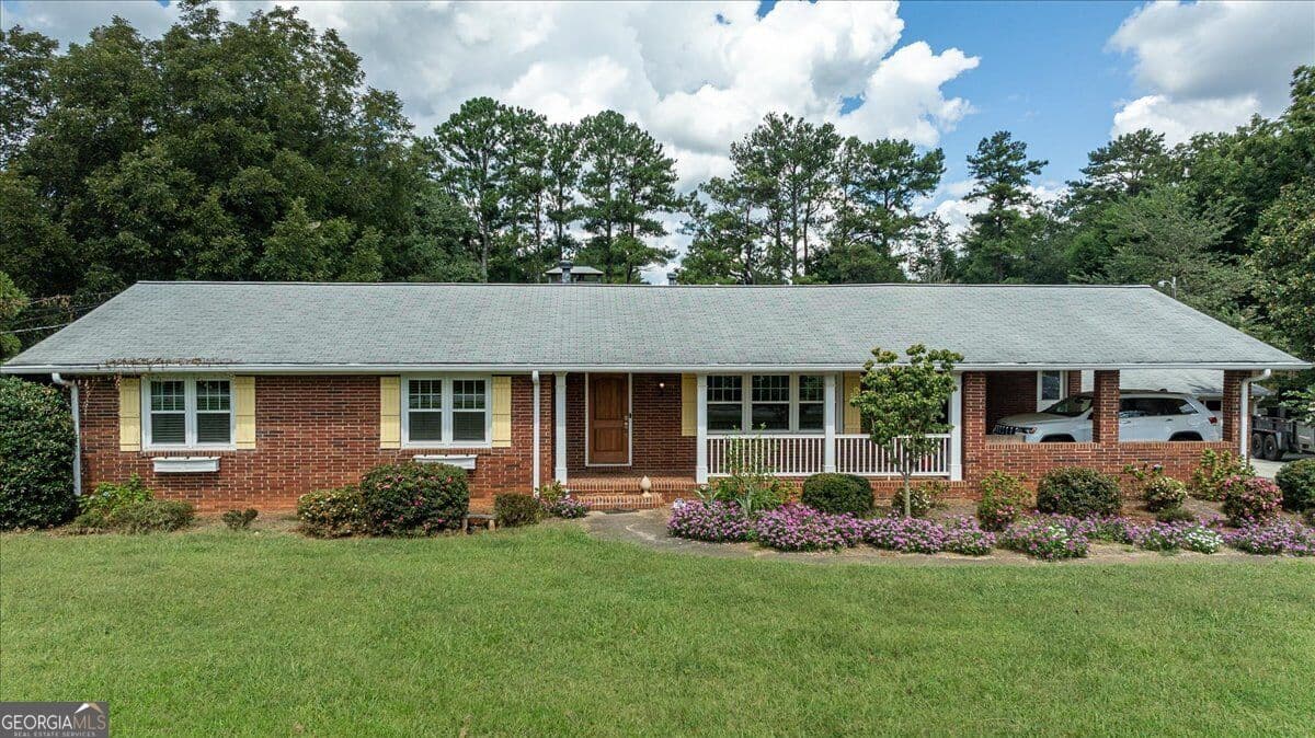 4 bedroom, 3 bathroom, 3,820 sq ft single family residence for sale at 580 Hurt Road, Smyrna, GA 30082 — photo 1 of 52