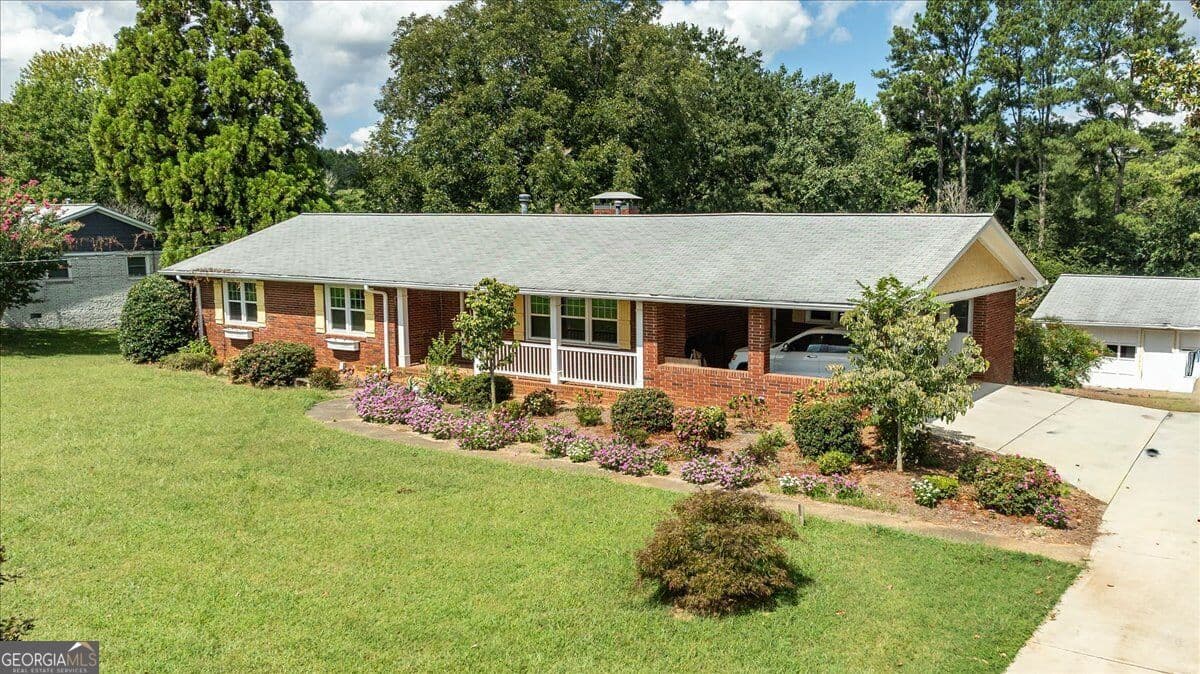4 bedroom, 3 bathroom, 3,820 sq ft single family residence for sale at 580 Hurt Road, Smyrna, GA 30082 — photo 5