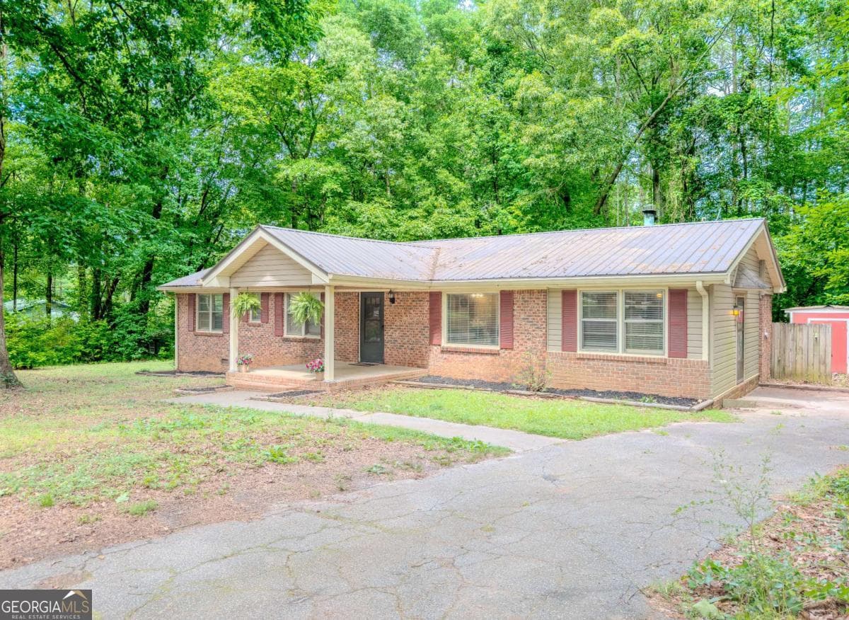 4 bedroom, 2 bathroom, 1,701 sq ft single family residence sold at 1648 Dogwood Trail, Monroe, GA 30655