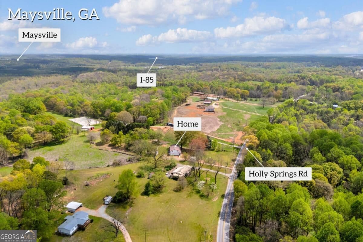 4 bedroom, 3 bathroom, 3,030 sq ft single family residence for sale at 8606 Holly Springs Road, Maysville, GA 30558 — photo 6