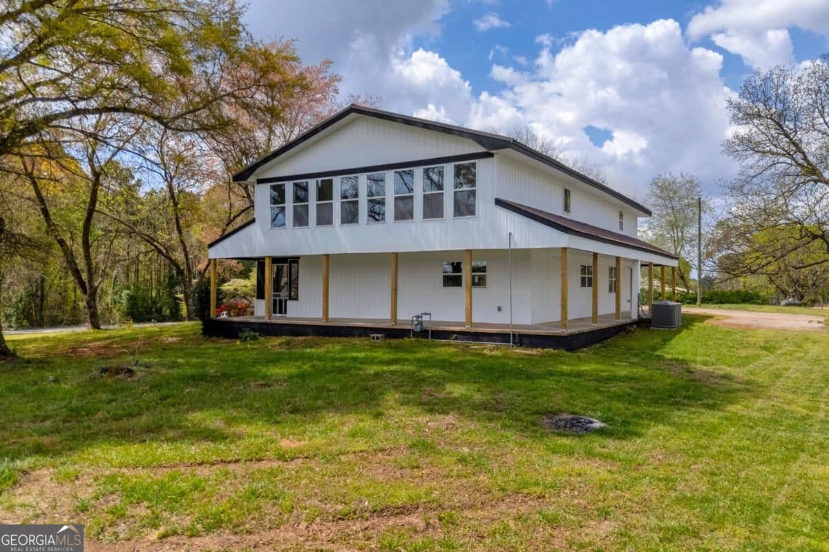 4 bedroom, 3 bathroom, 3,030 sq ft single family residence for sale at 8606 Holly Springs Road, Maysville, GA 30558