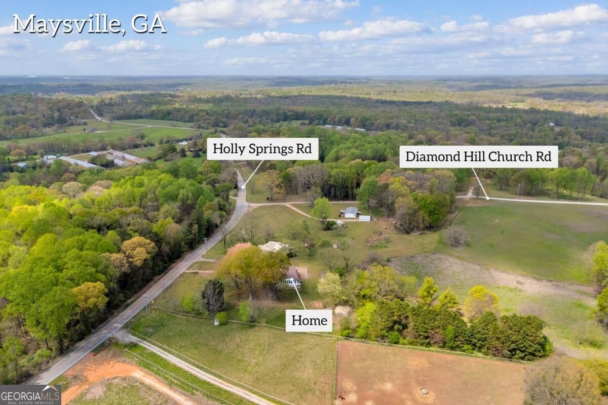 4 bedroom, 3 bathroom, 3,030 sq ft single family residence for sale at 8606 Holly Springs Road, Maysville, GA 30558 — photo 9