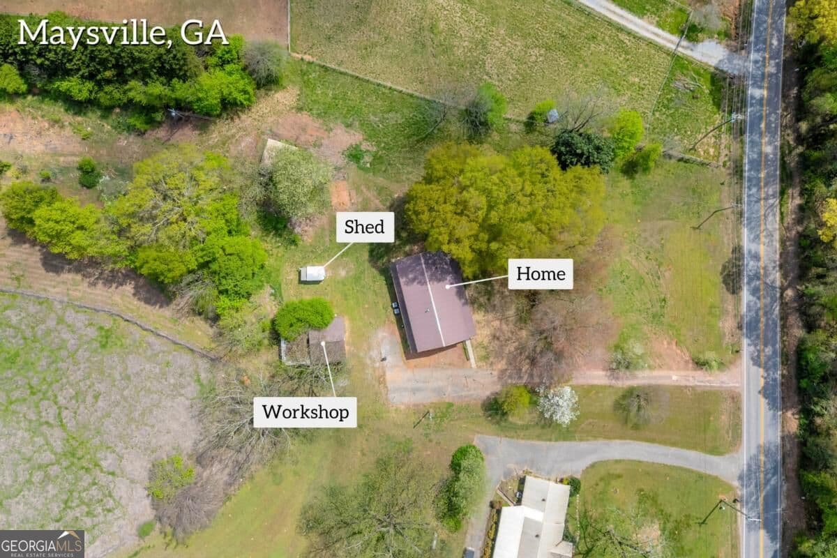4 bedroom, 3 bathroom, 3,030 sq ft single family residence for sale at 8606 Holly Springs Road, Maysville, GA 30558 — photo 4