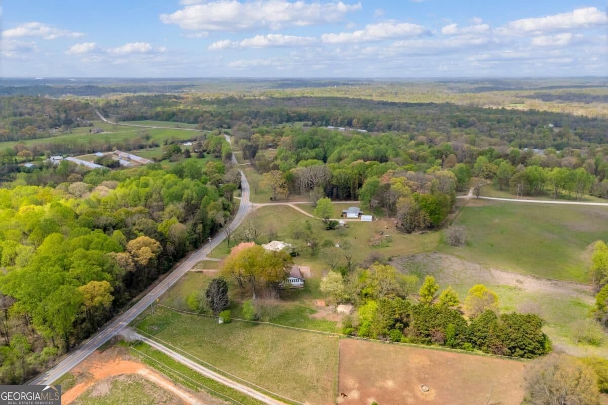 4 bedroom, 3 bathroom, 3,030 sq ft single family residence for sale at 8606 Holly Springs Road, Maysville, GA 30558 — photo 8