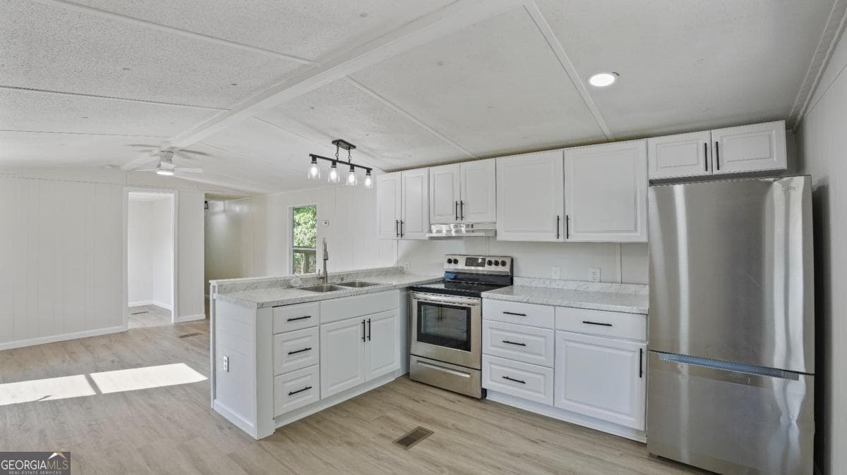2 bedroom, 1 bathroom, 840 sq ft manufactured home,single family residence for sale at 50 Sangster Road, Jesup, GA 31545 — photo 2