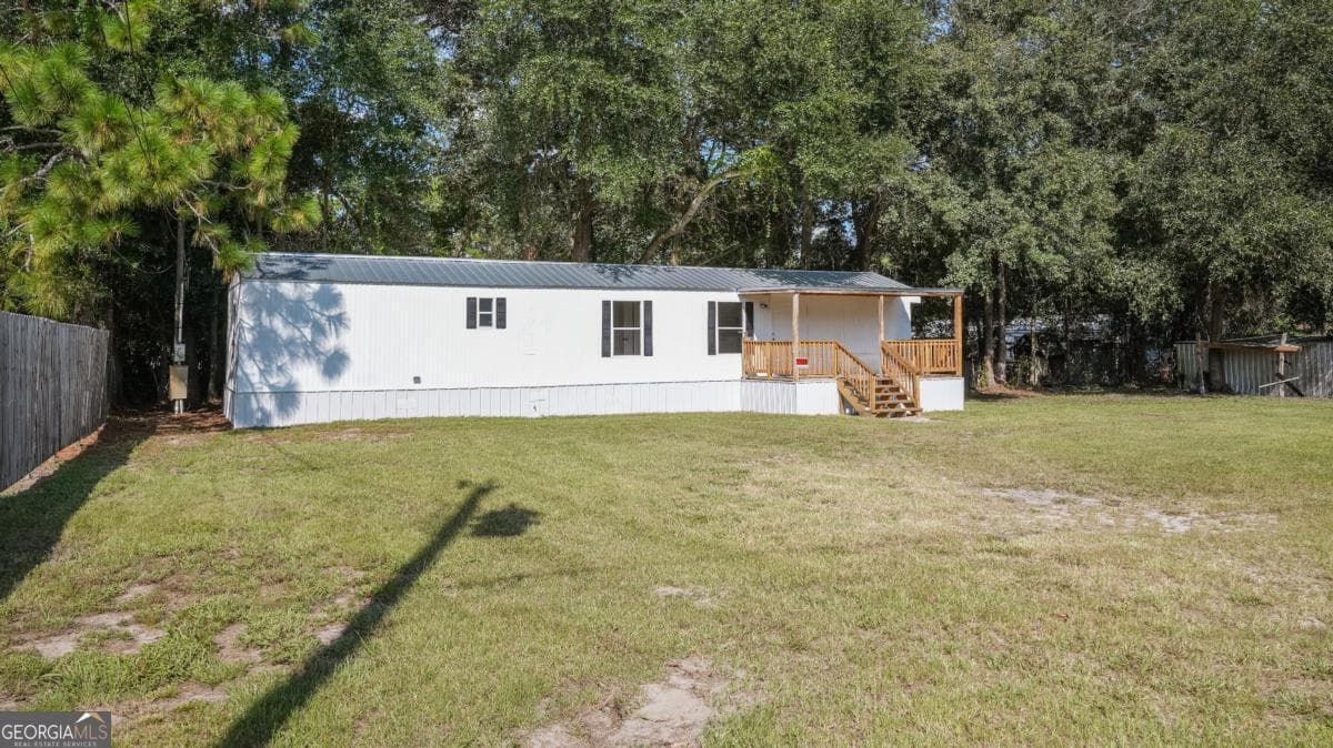 2 bedroom, 1 bathroom, 840 sq ft manufactured home,single family residence for sale at 50 Sangster Road, Jesup, GA 31545 — photo 6