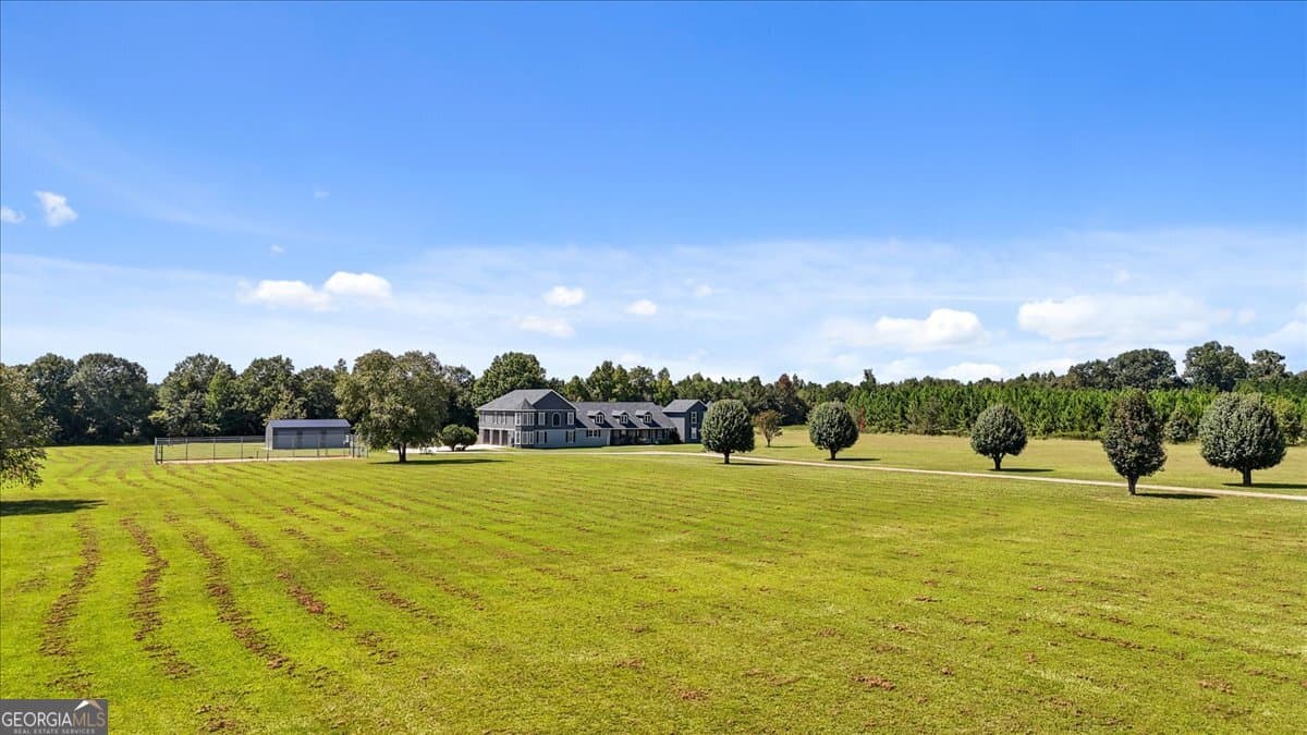 7 bedroom, 4.5 bathroom, 7,338 sq ft single family residence under contract at 156 Orion Way, Byron, GA 31008 — photo 7